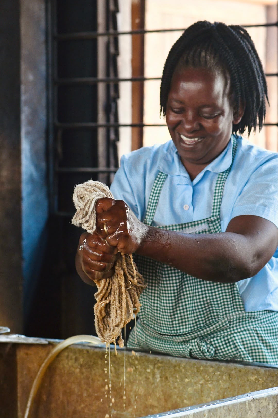 Artisan washing prepared yarn